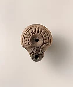 Terracotta oil lamp by Unknown Artist