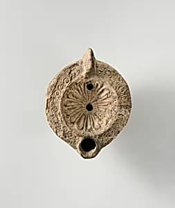 Terracotta oil lamp by Unknown Artist