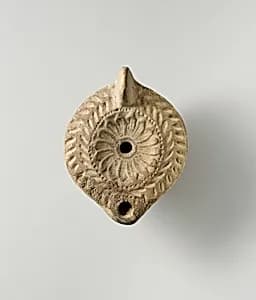 Terracotta oil lamp by Unknown Artist