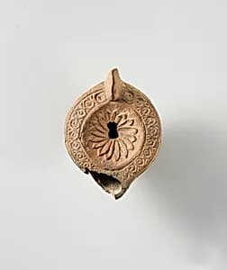 Terracotta oil lamp by Unknown Artist