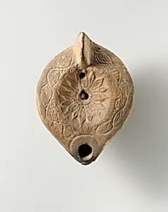 Terracotta oil lamp by Unknown Artist