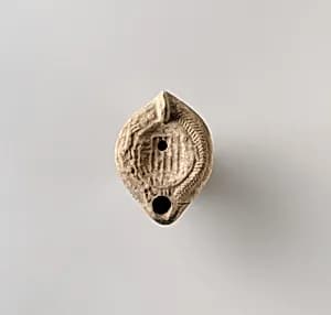 Terracotta oil lamp by Unknown Artist