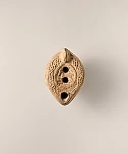 Terracotta oil lamp by Unknown Artist