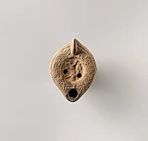 Terracotta oil lamp by Unknown Artist