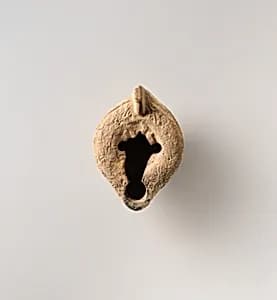 Terracotta oil lamp by Unknown Artist