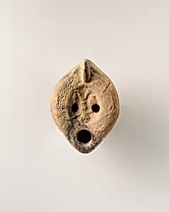 Terracotta oil lamp by Unknown Artist