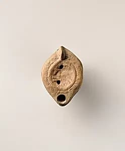 Terracotta oil lamp by Unknown Artist