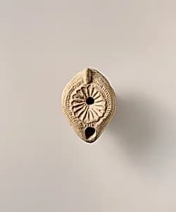 Terracotta oil lamp by Unknown Artist