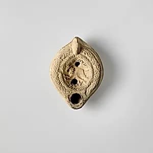 Terracotta oil lamp by Unknown Artist