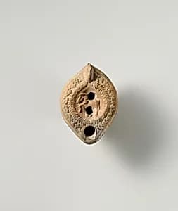 Terracotta oil lamp by Unknown Artist