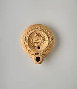 Terracotta oil lamp by Unknown Artist