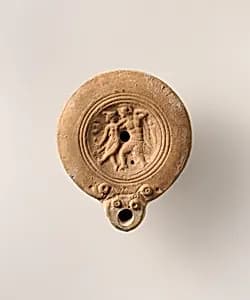 Terracotta oil lamp by Unknown Artist