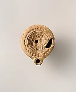 Terracotta oil lamp by Unknown Artist
