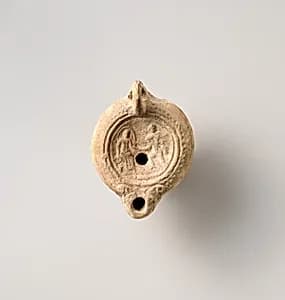 Terracotta oil lamp by Unknown Artist