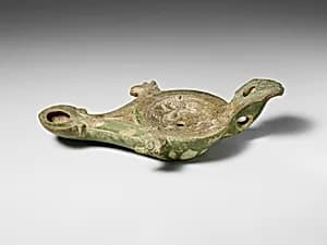 Terracotta oil lamp by Unknown Artist