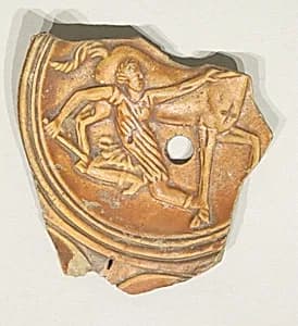 Terracotta oil lamp fragment by Unknown Artist