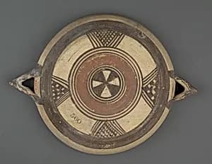 Terracotta plate with horned handles by Unknown Artist