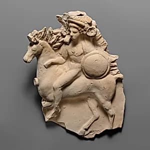 Terracotta relief of a horseman by Unknown Artist