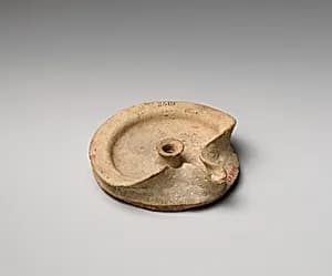 Terracotta saucer-shaped lamp by Unknown Artist