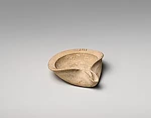Terracotta saucer-shaped lamp by Unknown Artist