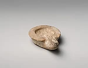 Terracotta saucer-shaped lamp by Unknown Artist