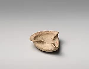 Terracotta saucer-shaped lamp by Unknown Artist