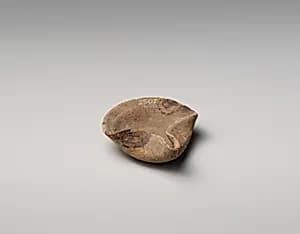 Terracotta saucer-shaped lamp by Unknown Artist