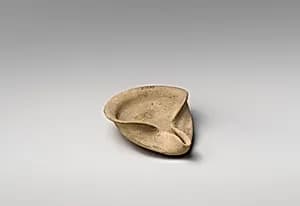 Terracotta saucer-shaped lamp by Unknown Artist