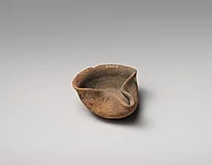 Terracotta saucer-shaped lamp by Unknown Artist