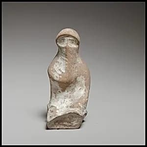 Terracotta seated veiled woman by Unknown Artist