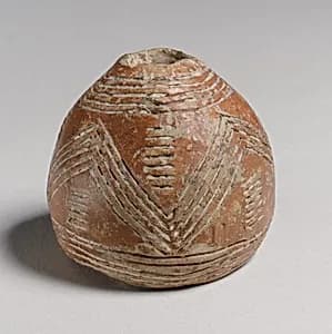 Terracotta spindle whorls by Unknown Artist