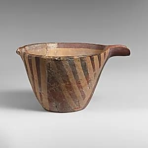 Terracotta spouted conical bowl by Unknown Artist