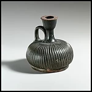Terracotta squat lekythos (oil flask) by Unknown Artist