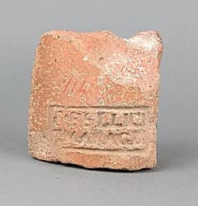 Terracotta stamped mortarium fragment by Unknown Artist