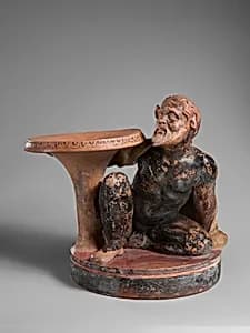 Terracotta stand with a satyr by Unknown Artist