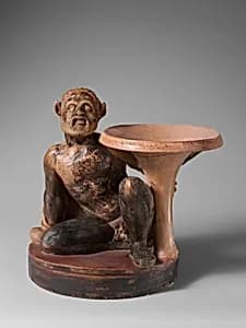 Terracotta stand with a satyr by Unknown Artist