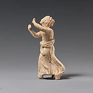 Terracotta statuette of a girl by Unknown Artist