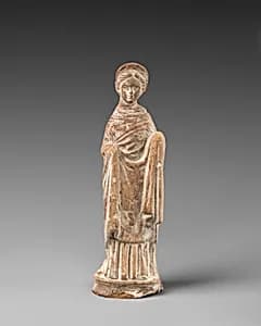 Terracotta statuette of a woman by Unknown Artist