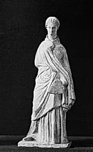 Terracotta statuette of a woman by Unknown Artist