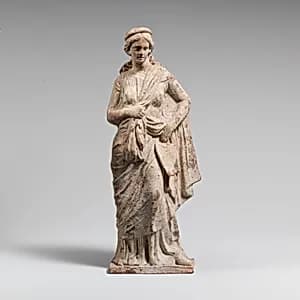 Terracotta statuette of a woman by Unknown Artist