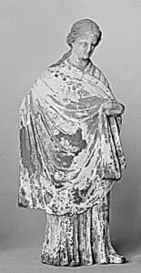 Terracotta statuette of a woman by Unknown Artist