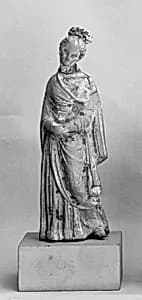 Terracotta statuette of a woman by Unknown Artist