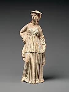Terracotta statuette of a woman by Unknown Artist
