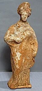 Terracotta statuette of a woman by Unknown Artist