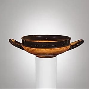 Terracotta stemless kylix (drinking cup) by Unknown Artist