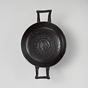 Terracotta stemless kylix (drinking cup) by Unknown Artist