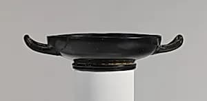 Terracotta stemless kylix (drinking cup) by Unknown Artist