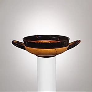 Terracotta stemless kylix (drinking cup) by Unknown Artist