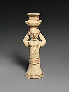 Terracotta woman carrying a jar by Unknown Artist