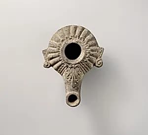 Terrracotta oil lamp by Unknown Artist